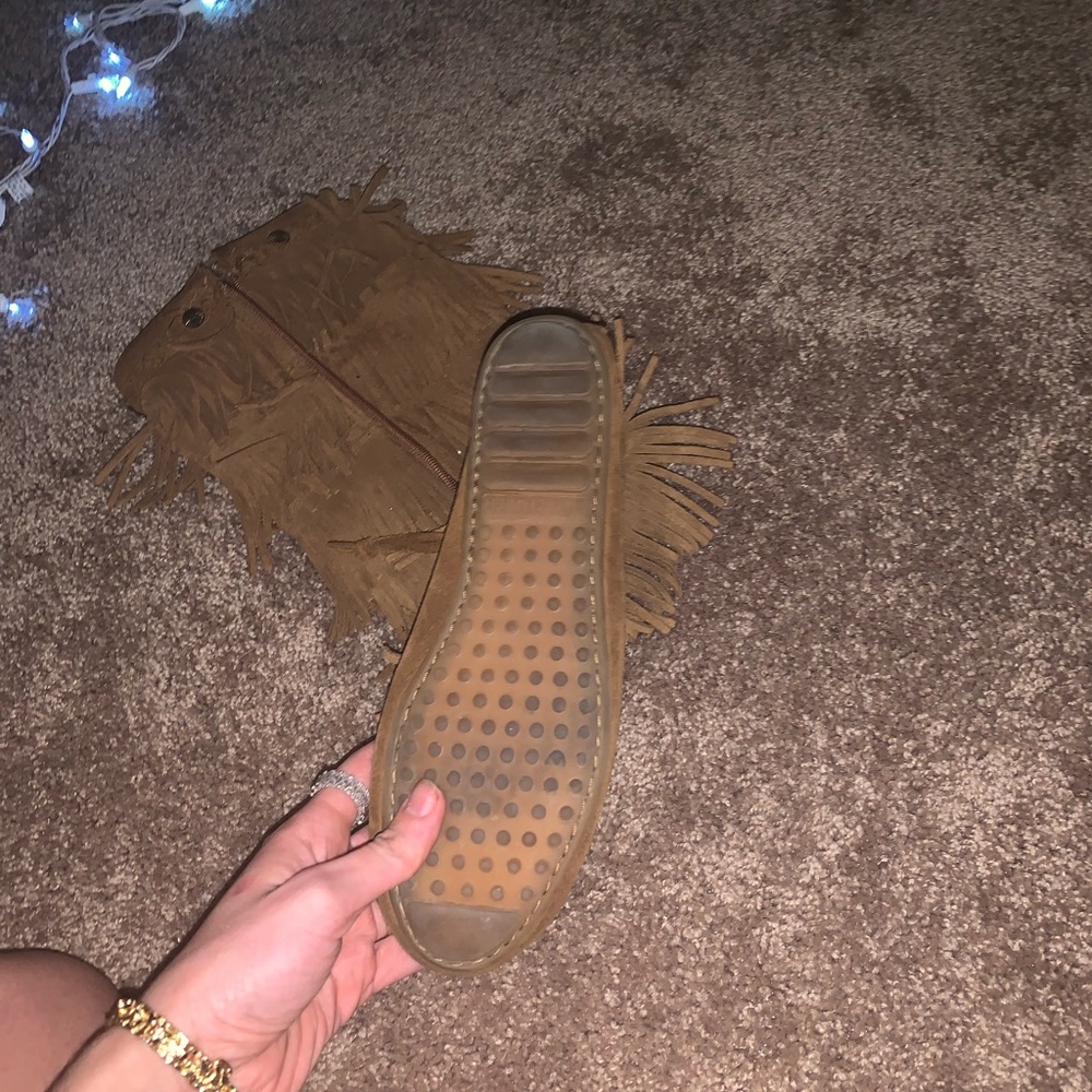 Brown moccasin boots